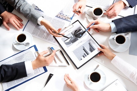 Image of hands of working businesspeople at meeting の写真素材