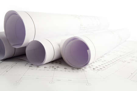 Close-up of blueprints with sketches of projects