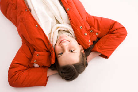 Above angle of smiling girl looking at cameraの写真素材