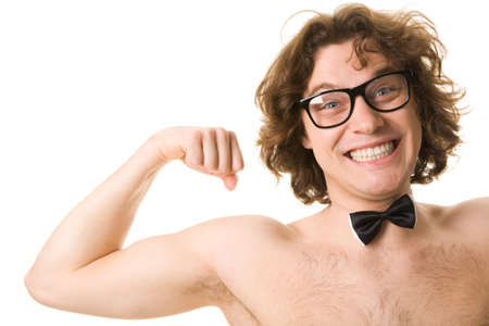 Portrait of man with bowtie showing his strengthの写真素材