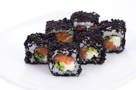 Image of maki sushi rolls in black caviarの写真素材