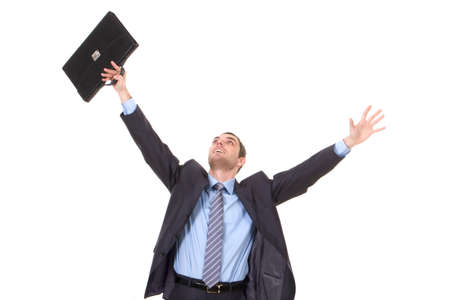 Portrait of successful businessman with briefcase in handの写真素材