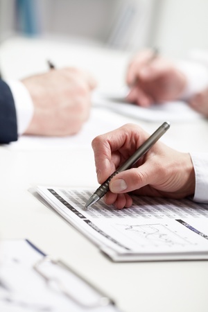 Image of businesswomans hand writing の写真素材