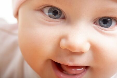 Face of adorable baby looking at camera