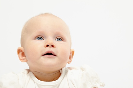 Portrait of cute child over white backgroundの写真素材