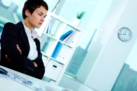 Photo of smart businesswoman sitting in officeの写真素材