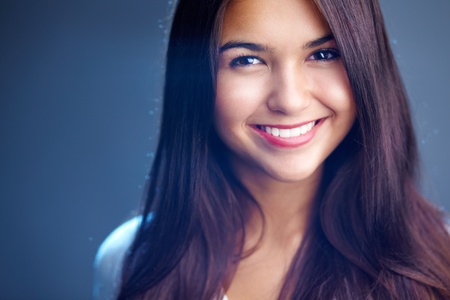 Portrait of young girl with perfect face and teeth の写真素材