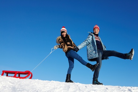 Portrait of happy couple in warm clothes spending time outdoor in winter の写真素材