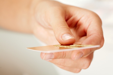 Macro image of plastic card in human handの写真素材