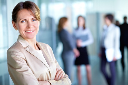 Image of smiling middle aged businesswoman looking at cameraの写真素材