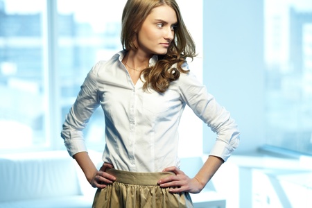 Image of gorgeous woman in smart casual looking asideの写真素材