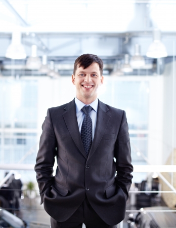 Portrait of happy businessman looking at camera with smileの写真素材