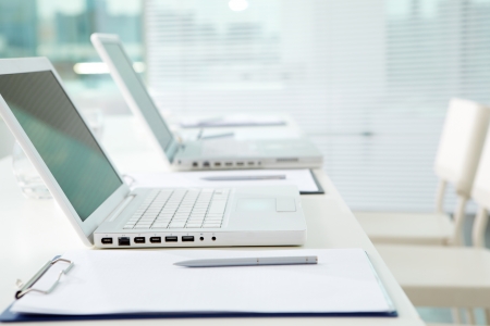 Image of laptops on tableの写真素材
