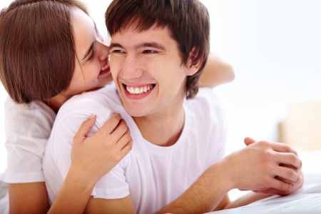 Portrait of happy young couple laughingの写真素材