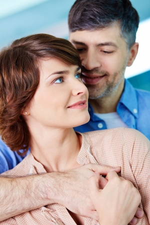 Portrait of tender couple enjoying being togetherの写真素材