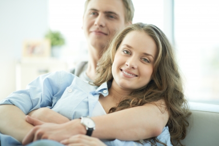 Portrait of amorous young couple enjoying restの写真素材