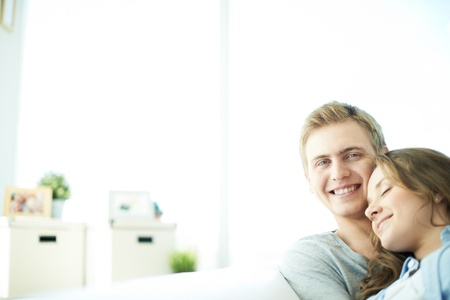 Portrait of amorous young couple enjoying restの写真素材