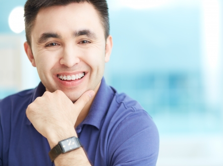 Portrait of cheerful businessman looking at camera with smileの写真素材