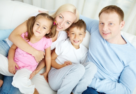 Portrait of happy family with two children looking at camera の写真素材