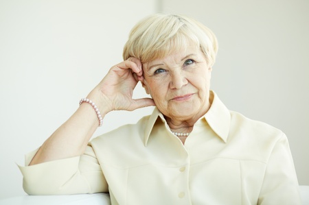 Portrait of elderly female looking at camera