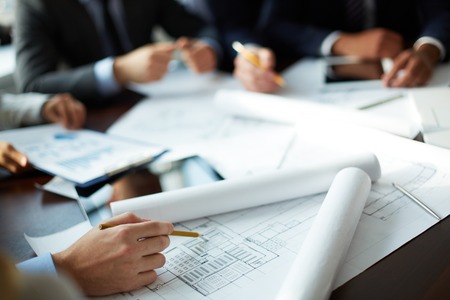 Image of human hand with pencil over sketch の写真素材