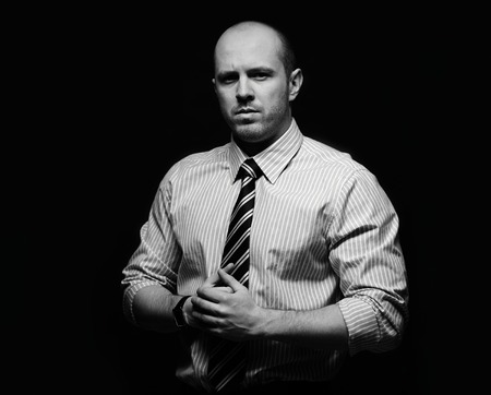 Portrait of serious businessman looking at cameraの写真素材