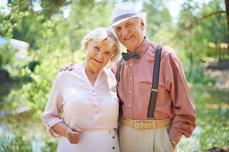 Happy seniors in smart casual enjoying summer rest Happy seniors in smart casual enjoying summer rest