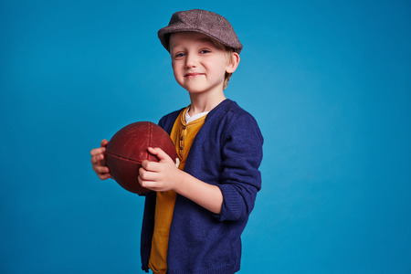 Portrait of a boy with footballの写真素材