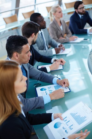 Group of business people sitting at seminarの写真素材