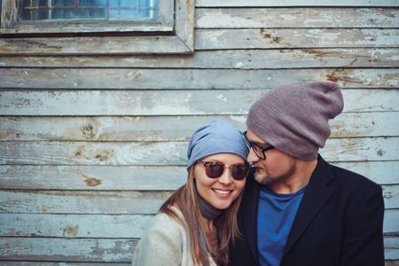 Happy young dates on background of old buildingの写真素材