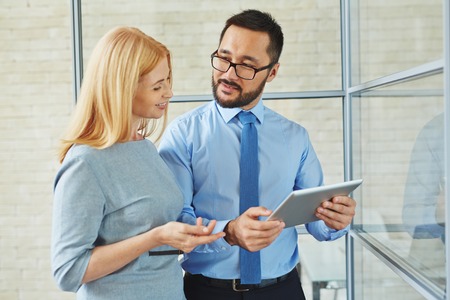 Partners communicating in office during meetingの写真素材