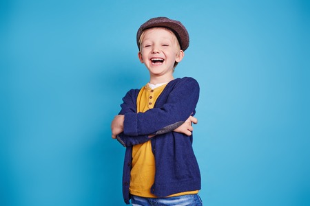 Laughing little boy in casualwearの写真素材