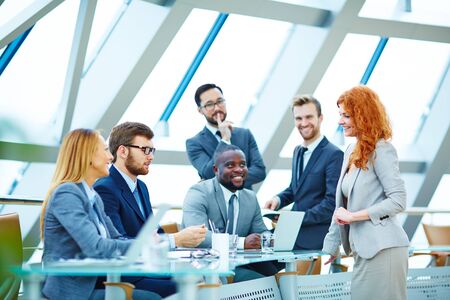 Modern employees communicating at meetingの写真素材