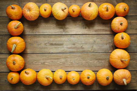 Image of pumpkins on a wooden tableの写真素材