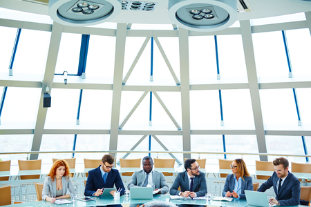 Young employees working at meetingの写真素材