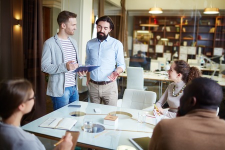 Casual business people working together at officeの写真素材