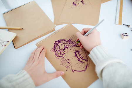 Picture of young female being drawn by manの写真素材