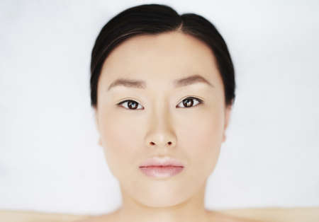 Close-up of a clean face of Asian womanの写真素材