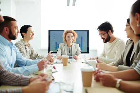 Business team having meeting with a young female leader
