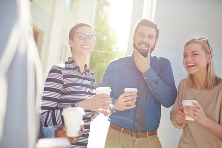 Several business people having meeting on summer dayの写真素材