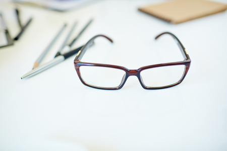Eyeglasses and other business stationaryの写真素材