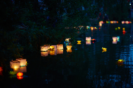 Burning lights on water surfaceの写真素材
