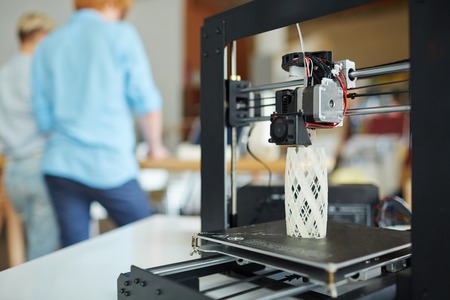 Modern 3d printer with architectural model