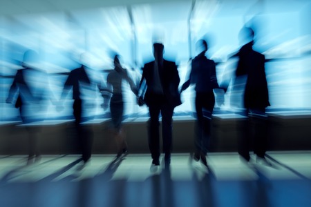 Unrecognizable business people holding handsの写真素材