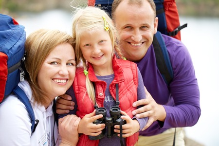 Portrait of smiling family looking at cameraの写真素材