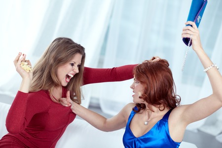 Two furious women fighting cruellyの写真素材