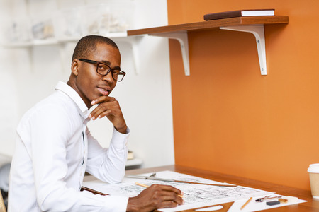 Confident designer thinking of new project at workplaceの写真素材