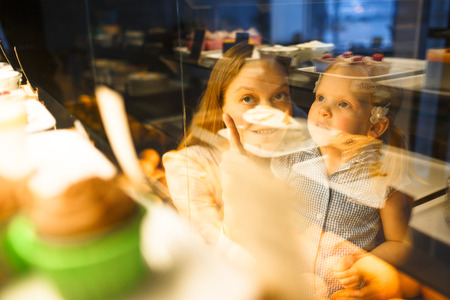 Choosing cupcakesの写真素材