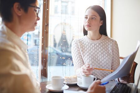 Two Business Partners Discussing Contractの写真素材