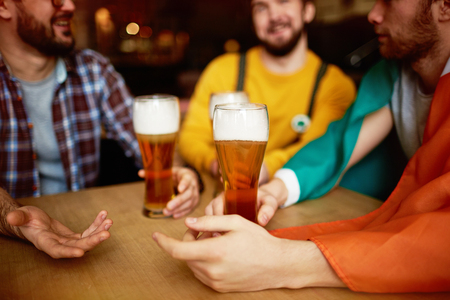 Tall Glasses of Craft Beer in Pubの写真素材